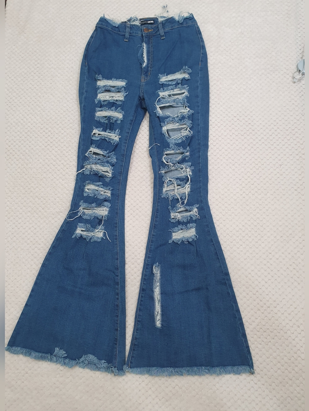 Fashion Nova Extreme Distressed Bell Bottom Jeans | Blue High Rise Flare